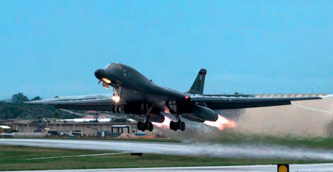 Lancers fly at night over Sea of Japan