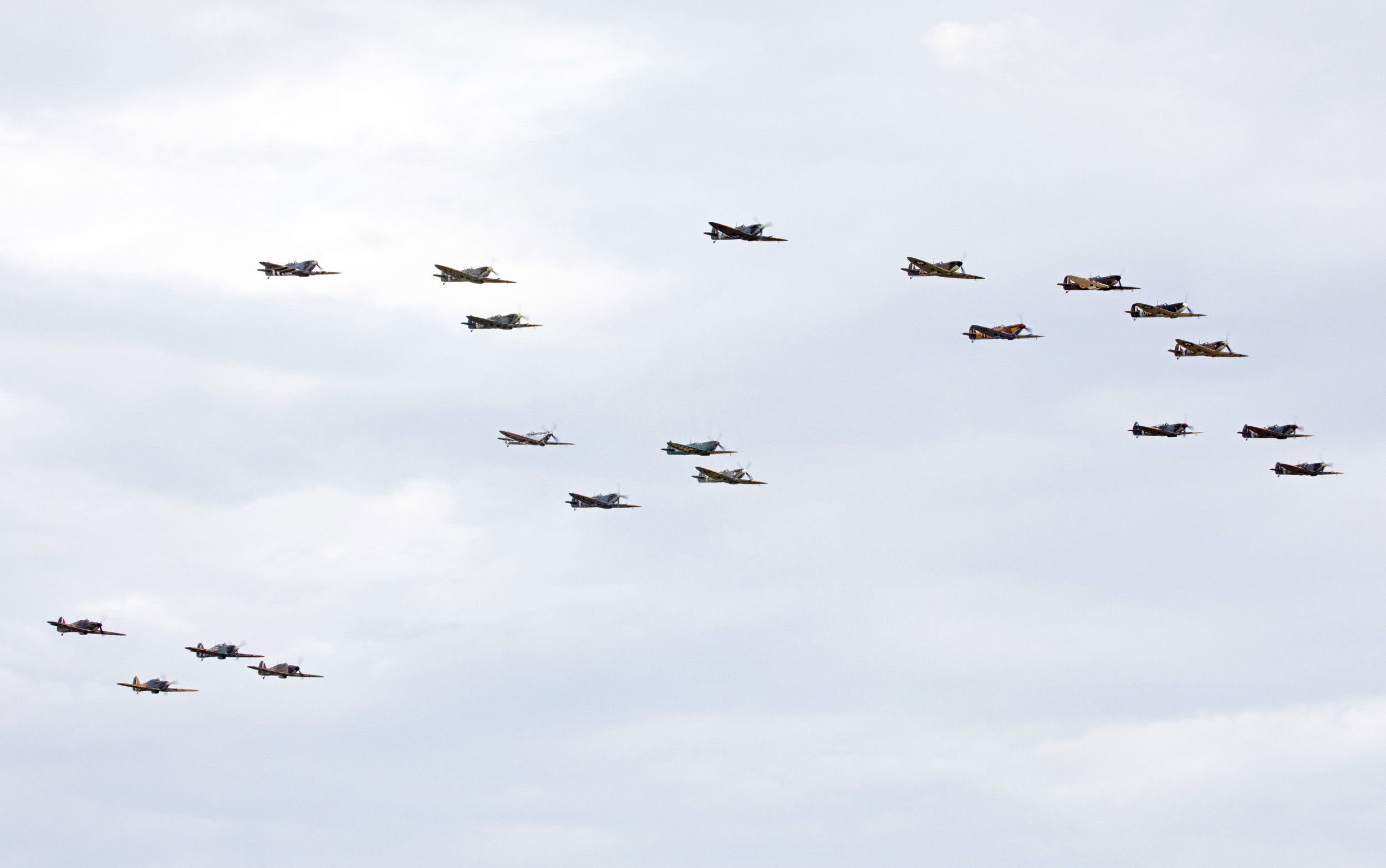 Dramatic Spitfire and Hurricane flypast stars at Duxford show