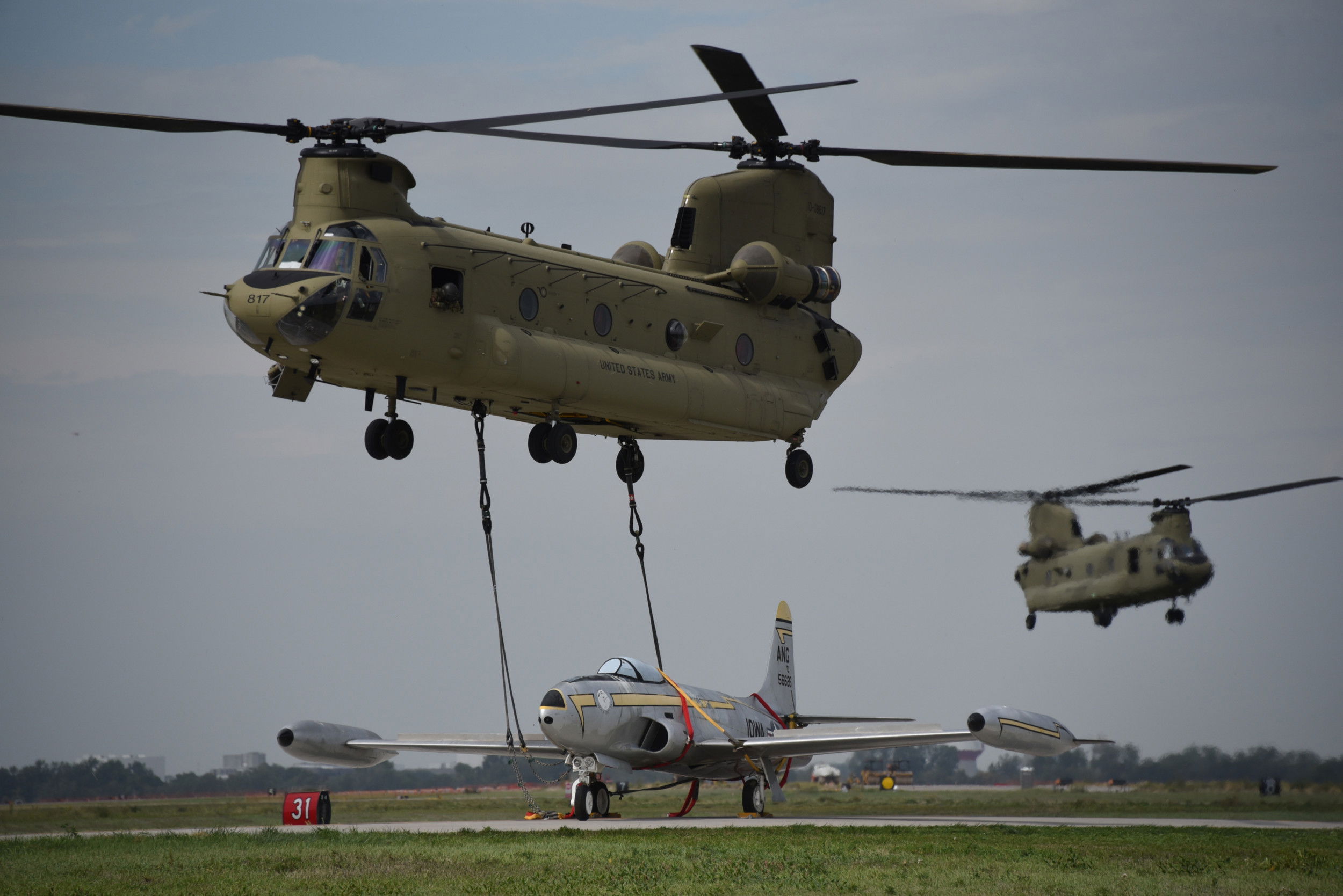 Iowa ARNG Chinook delivers historic fighter to Sioux City