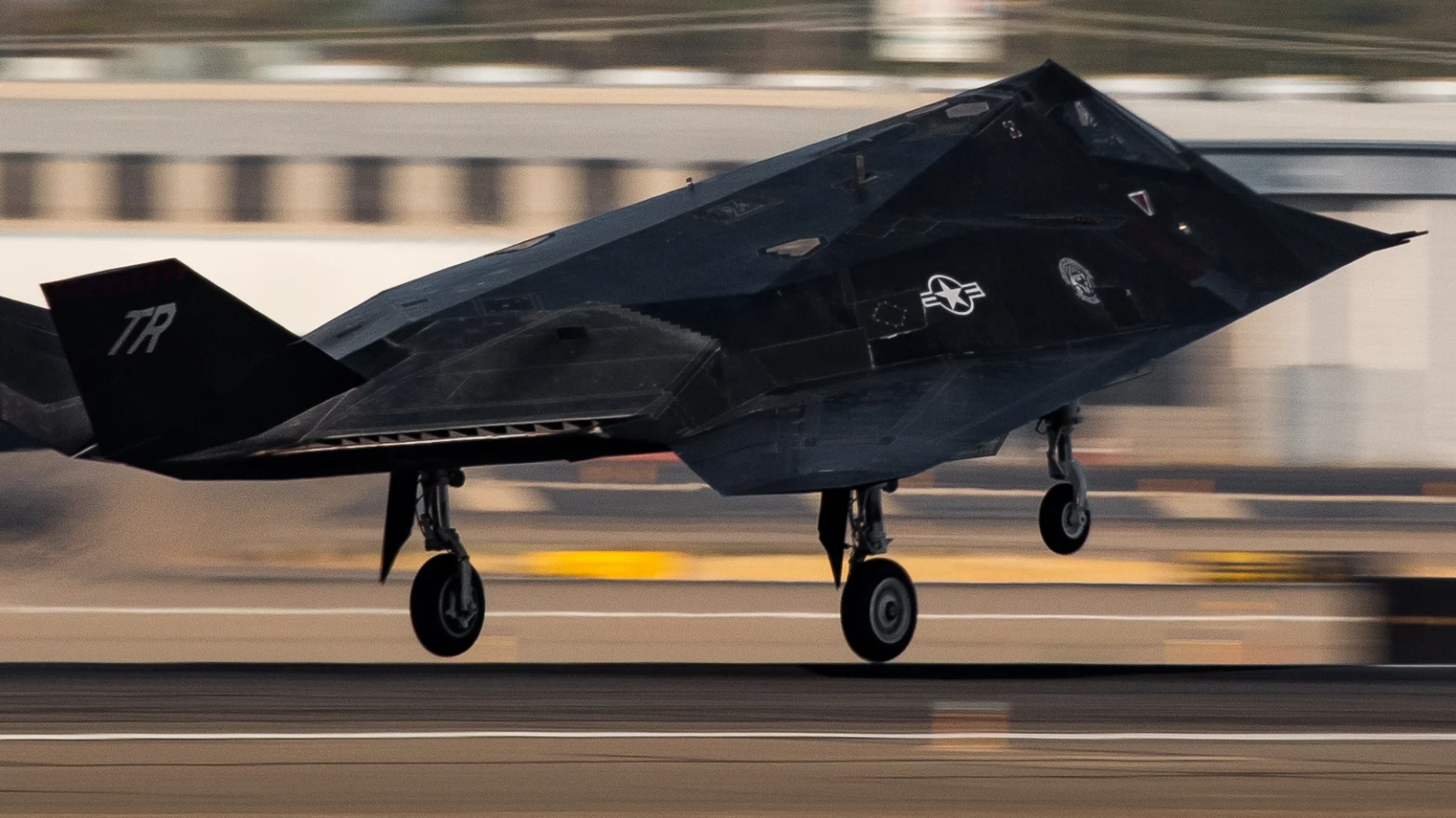 F-117As conduct DACT training with 144th FW F-15s