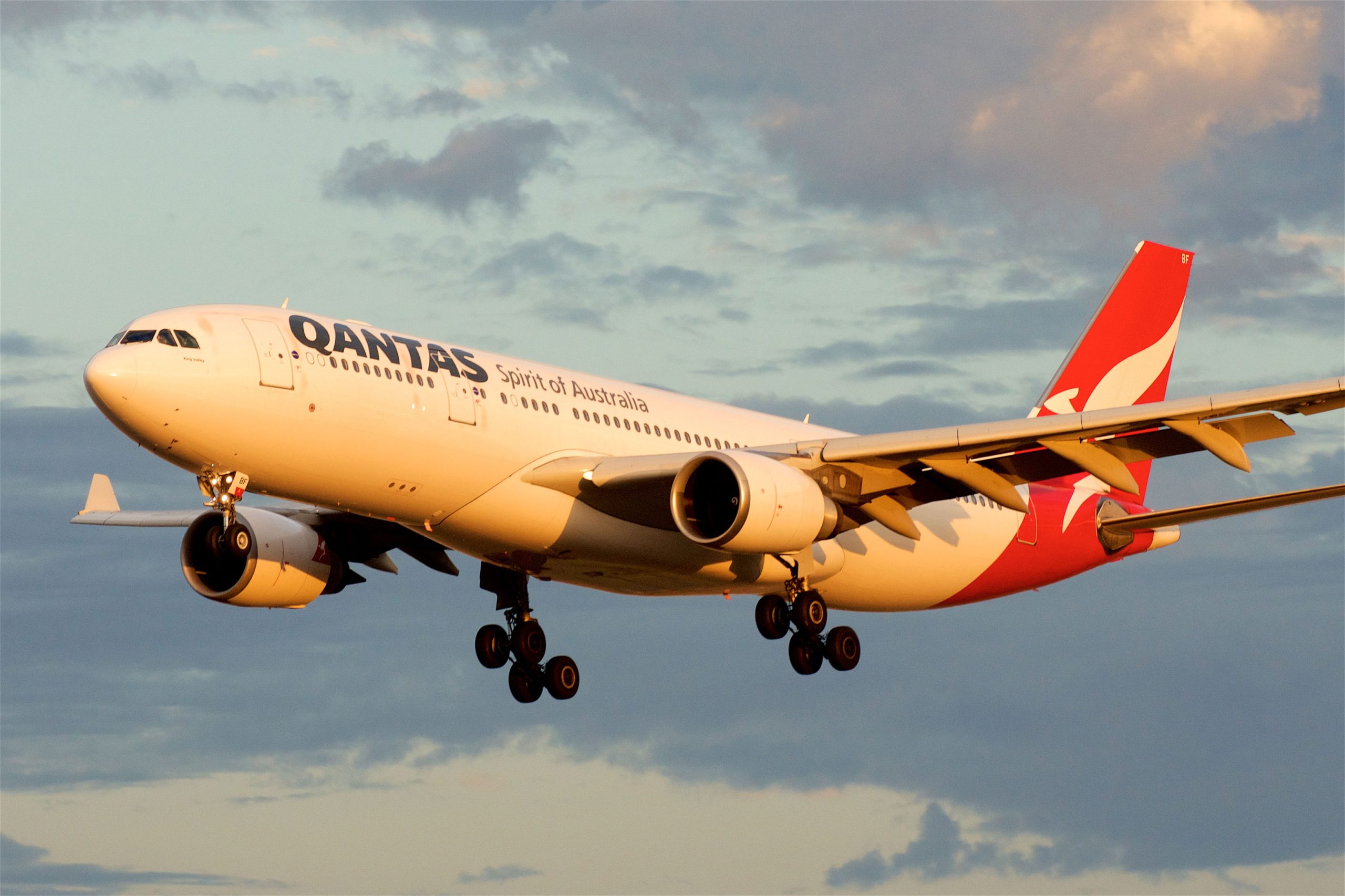 Which new long-haul cities does Qantas plan to fly direct?