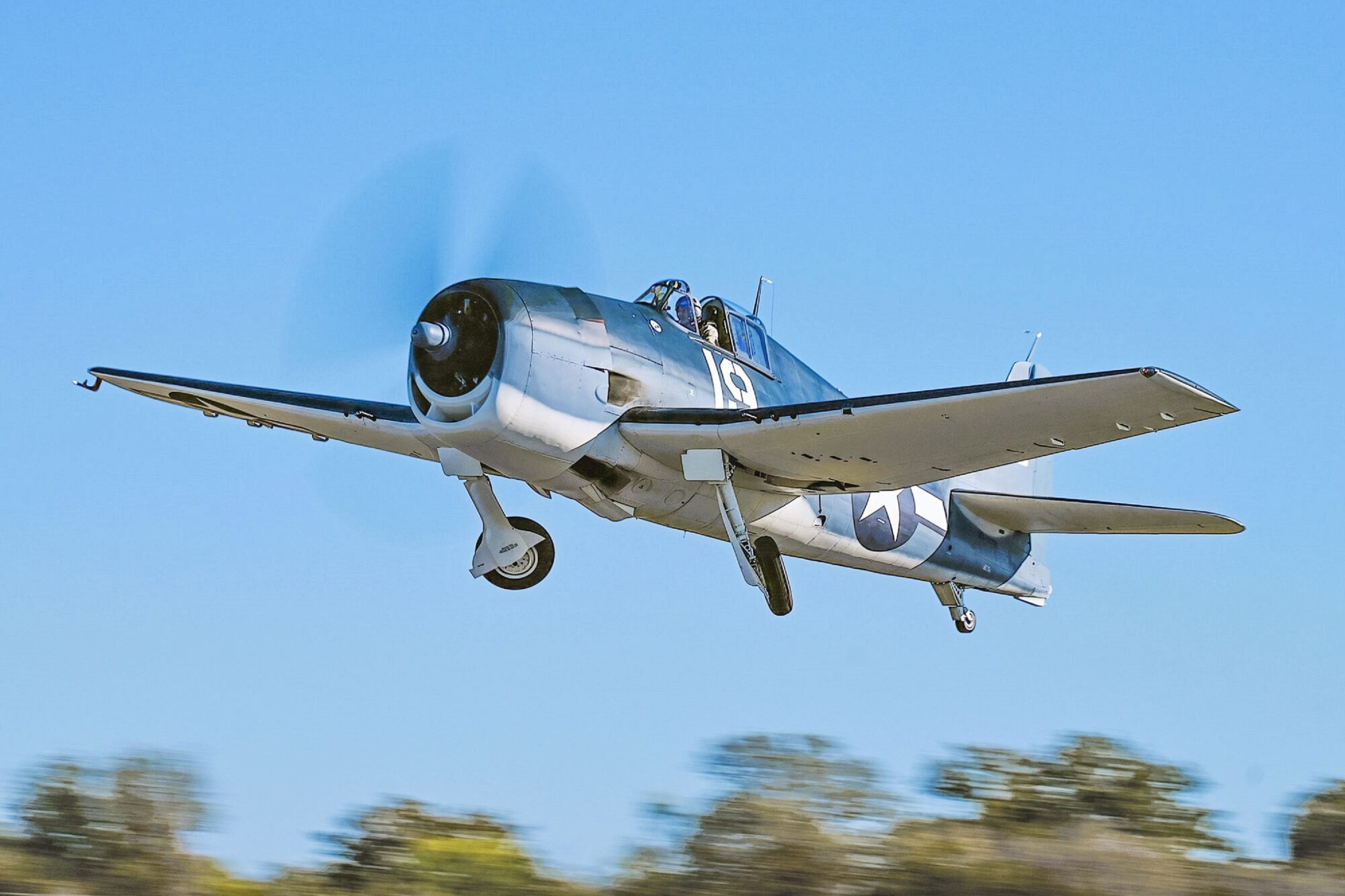 Post-restoration maiden flight for Grumman F6F Hellcat